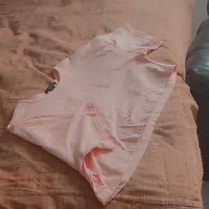 loose-fitted pink t-shirt crop top